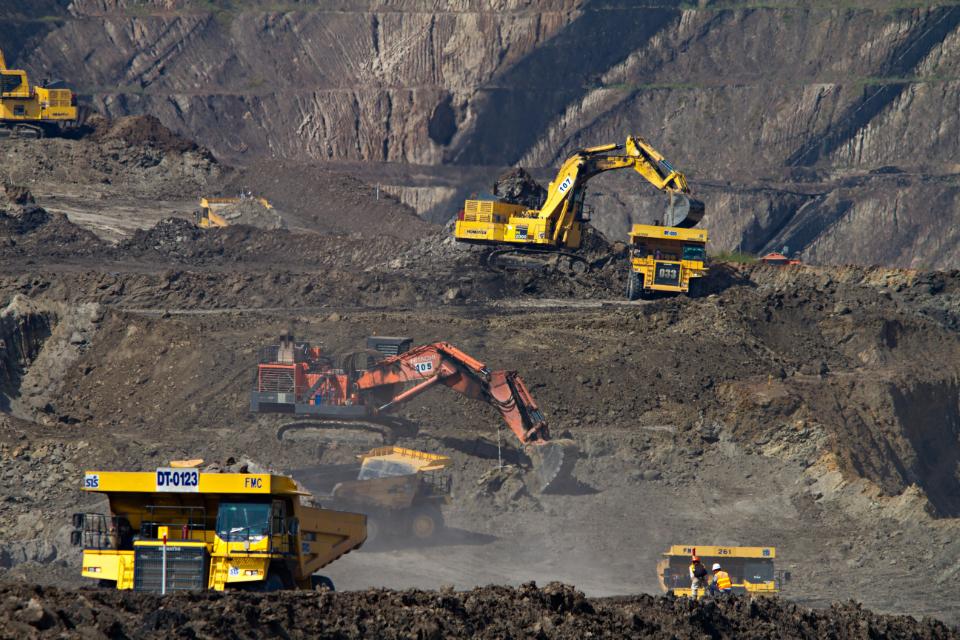 Heavy machinery operating in an open-pit mine